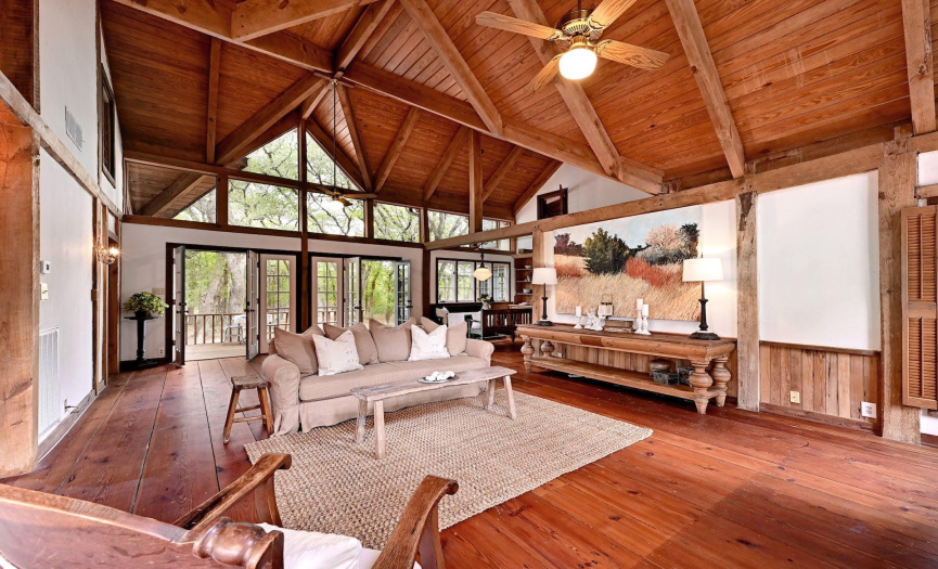 Living Room- Wide plank timber floors, amazing roof/ceiling timbers lead your eye directly onto the great outdoors.