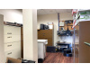 Storage Room and where the infrastructure for phones, internet, security system can be located. 