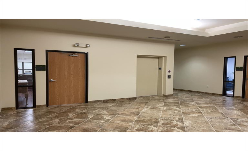 Entryway for Unit 200 which conveniently located by the elevator