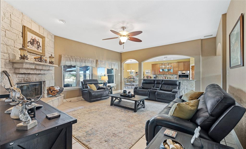 Family Room has Tiled Floors and Ceiling Fan with Light Kit