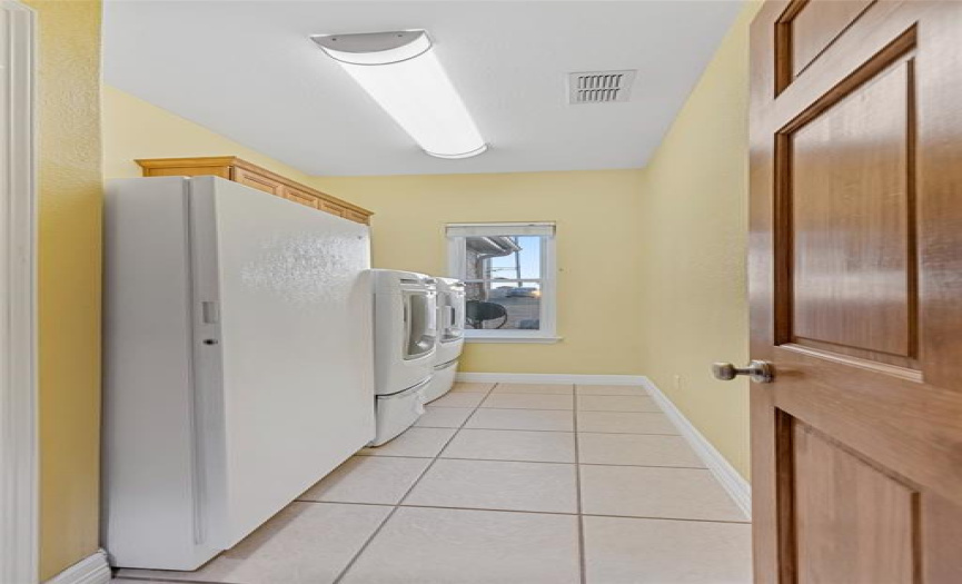 Big Laundry Room accommodates Washer/Dryer/Freezer/Fridge