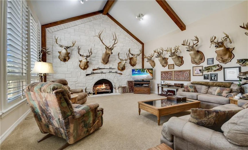Family room/trophy room with firepace