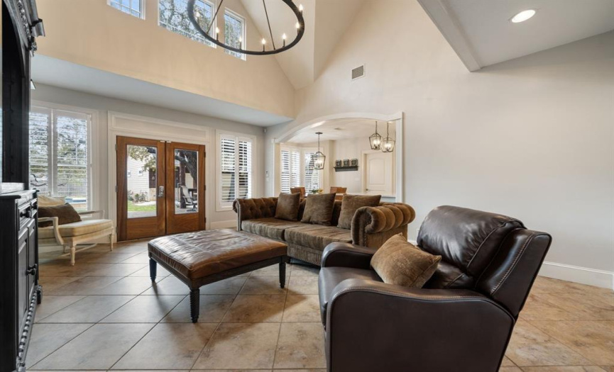 Spacious Family Gathering Room with Enormous Vaulted Ceilings up to Second Level 
