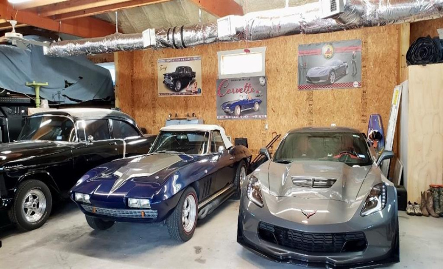 Oversized, 2 story Air Conditioned car lovers dream garage totaling over 2300sf. Plus Workshop and Office.