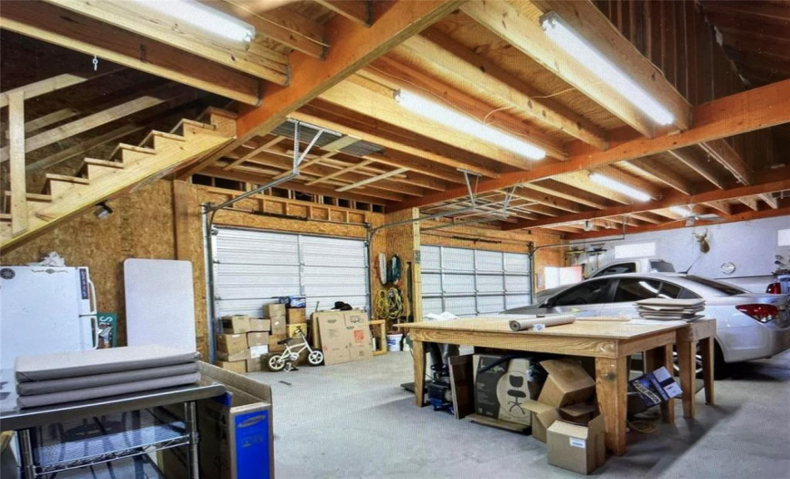 Oversized, 2 story Air Conditioned car lovers dream garage totaling over 2300sf.