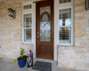  White Texas Stone w/Mahogany Front Door