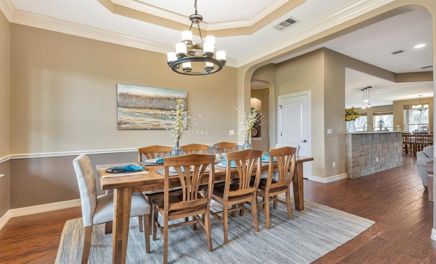 The formal dining is spacious enough to accommodate at least eight guests.