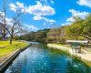 Benches align the river to invite you to slow down and take in the beauty of the Texas Hill Country.
