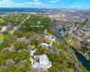 Minutes from historic Gruene, Landa Park, Schlitterbahn and downtown New Braunfels, this private location on the water is one of the most sought after in the breathtaking Texas Hill Country.