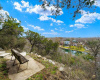 Serene and exclusive, this lookout could also potentially be explored as the future site of a private pool overlooking the Comal River. 