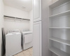 Laundry room conveniently located upstairs