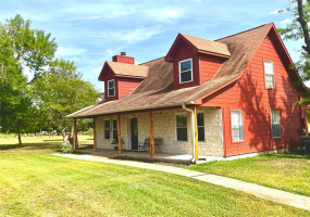 Adorable stone home on 3.8 acres of unrestricted land on a private cul-de-sac.
