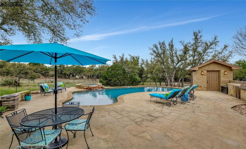Entertaining is a breeze with the outdoor kitchen. The pool bath adds to the ease.
