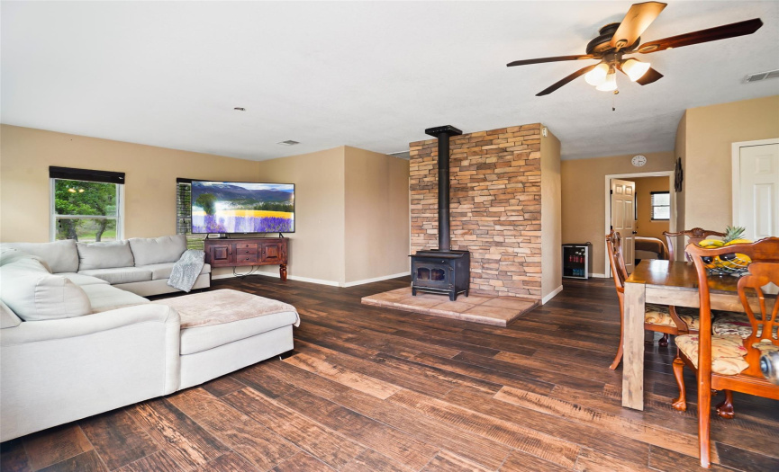 Open living room w/ fireplace