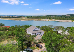 Home front with deep water Lake Travis behind it; low lake level of 638 ft