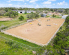 120 x 250 Fenced riding arena w/ automatic sprinkler system