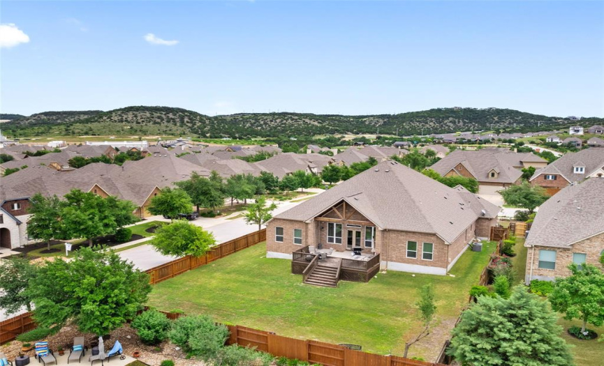 Aerial showing the beautiful Texas Hill Country surrounding the neighborhood.