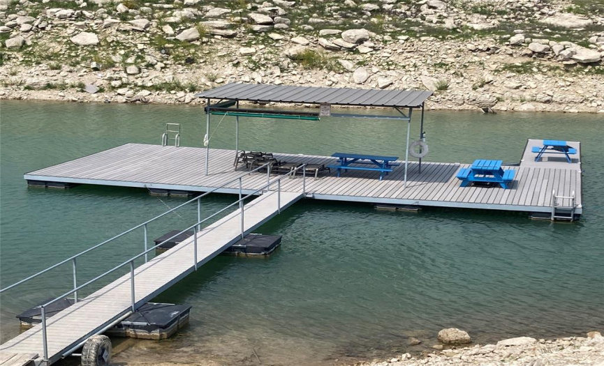 LAKE TRAVIS access:  HOA swim dock/ladders, partially covered with picnic tables, lounge chairs!