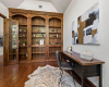 Office.  Volume ceilings and built in bookcases