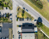 Birdseye view of building and parking lot