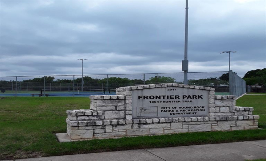Frontier Park with Tennis courts, children's playscapes, and picnic reunion pavilion a 10-minute walk from home.