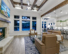 Open Living & Kitchen with Expansive Outdoor/Pool Views