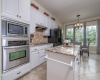 Kitchen is open to the Breakfast Room with a view out to the beautiful backyard!