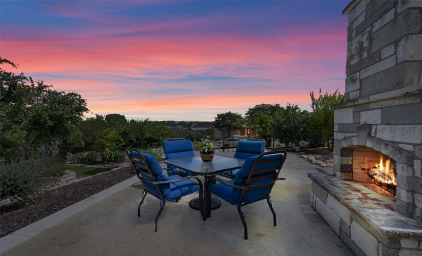 Watch the sunsets next to the outdoor fireplace