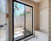 Imagine showering and looking out at the patio you brought to life