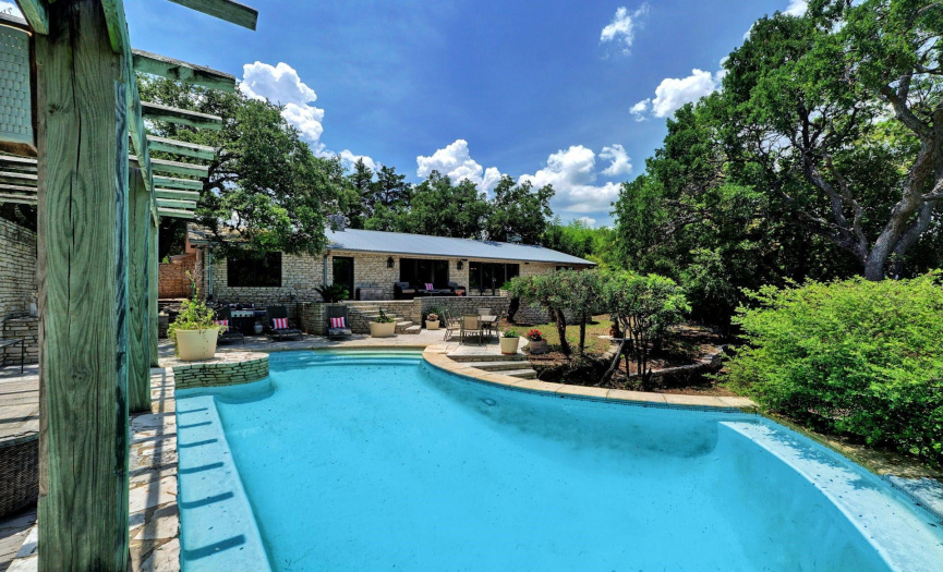 Picture yourself poolside at your new home, 13105 Mansfield Circle