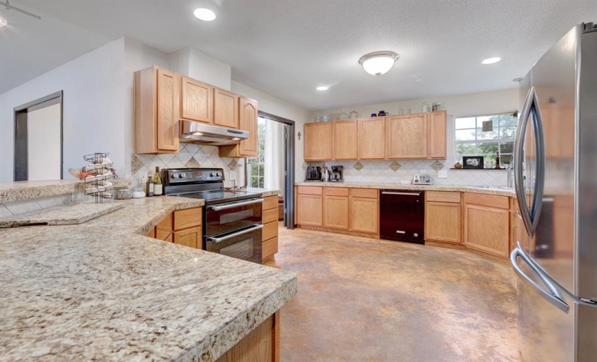 Whether you're a culinary enthusiast or simply enjoy cooking for loved ones, this kitchen is a dream come true.