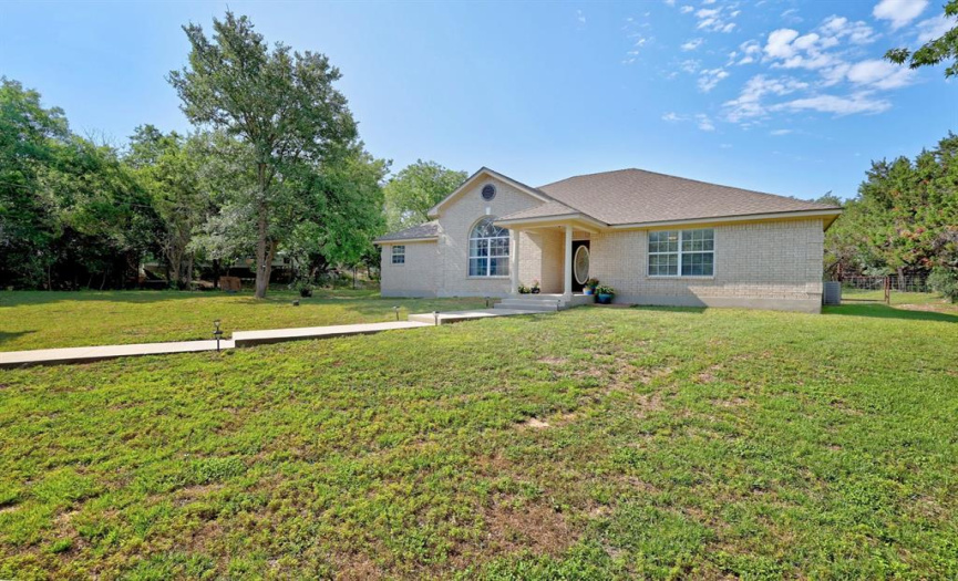 Built in 2004, the home offers an all brick exterior with a covered front porch and back patio.
