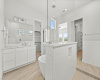 Luxury master bathroom built in niche in the shower wall and lots of cabinet space with medicine cabinets.