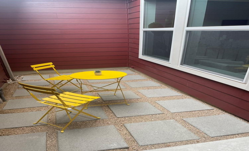 Patio with pavers and bistro set