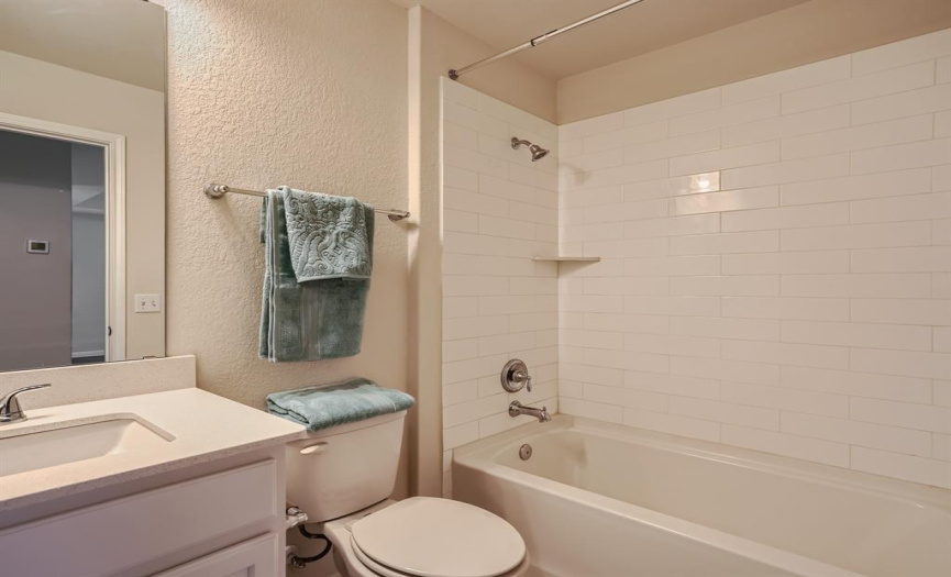 Guest back is next to the guest bedroom and easy access from family room. 