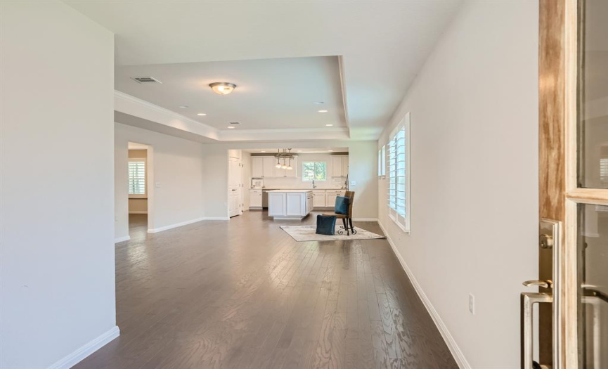 Wood floors gleam throughout the home.