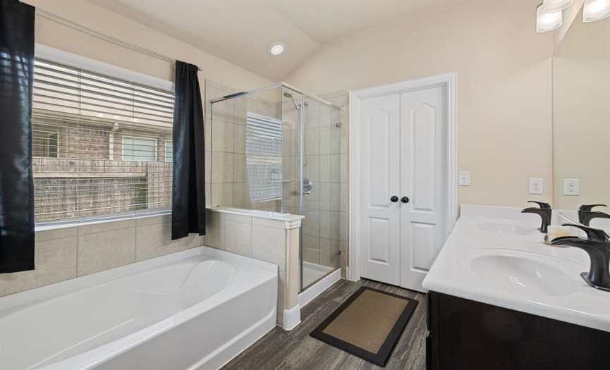 Primary bath with soaking tub and separate walk in shower