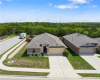 Front aerial view - corner lot - backs to walking trail and green area