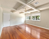 This wonderful space is the size of about three bedrooms.  I owner used this room to run his roofing company for years.