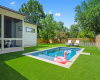 The large lot gives plenty of space for swimming, playing, gardening, and anything else you can imagine!