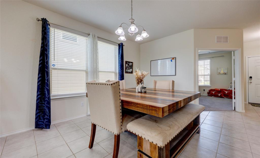 Another view of the dining area, home office & entry. Look at all that natural light! 608 Reinhardt Blvd, Georgetown TX 78626. MLS #1500692.