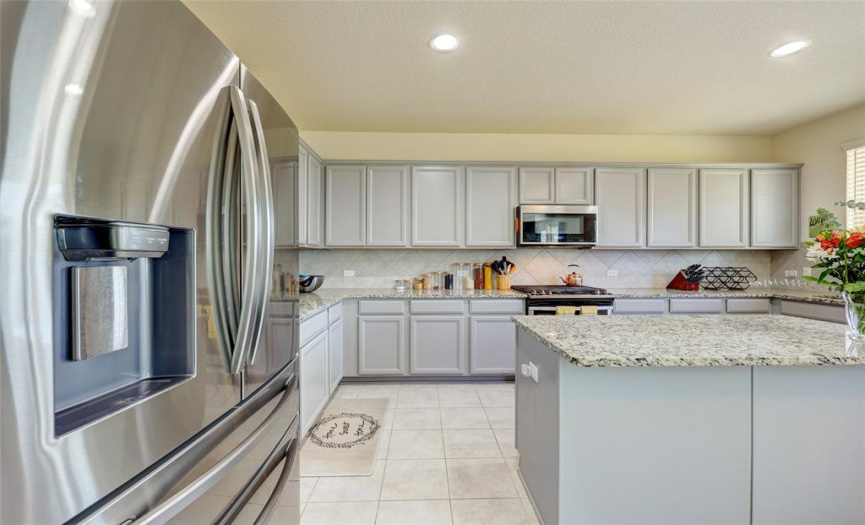 Abundant upper and lower cabinetry in this huge kitchen. Plenty of room for ALL your small appliances and more.608 Reinhardt Blvd, Georgetown TX 78626. MLS #1500692.