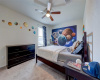 Good sized bedroom at the end of the upstairs hall. 608 Reinhardt Blvd, Georgetown TX 78626. MLS #1500692.