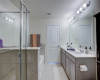 Separate shower, dual vanities, soaking tub.This Primary Bath really ma have it all. 608 Reinhardt Blvd, Georgetown TX 78626. MLS #1500692.