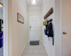 Tiled entryway leads to open-concept living/dining/kitchen and boasts a home office to the right and short hallway to the left that leads to a downstairs bedroom and full bath. Great floorplan! 608 Reinhardt Blvd, Georgetown TX 78626. MLS #1500692.