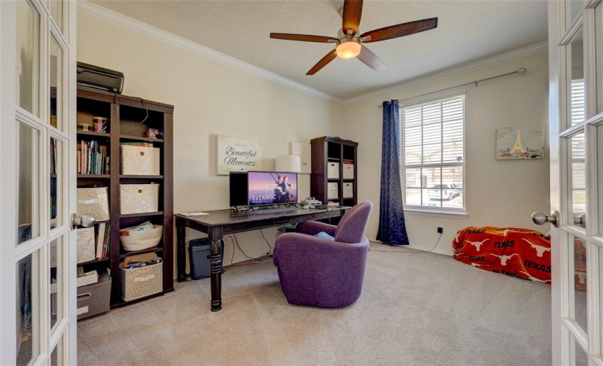 Fabulous home office could also be an exercise room, craft room or even an additional bedroom! 608 Reinhardt Blvd, Georgetown TX 78626. MLS #1500692.