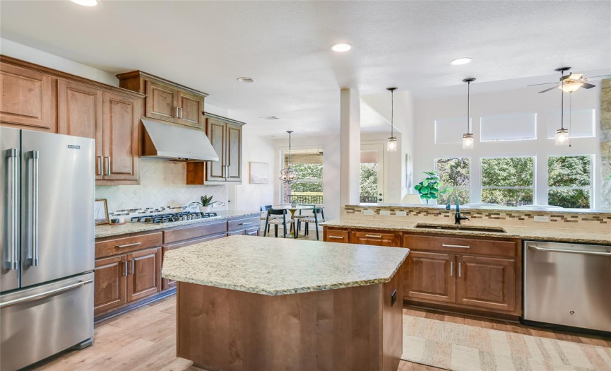 Fantastic kitchen with tons of storage, counter space, gas cooktop and island