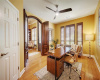 Study/office with custom arch molded alder wood double doors