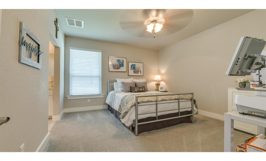 Generous secondary bedrooms and walk-in closets.