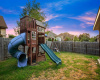 The fully-fenced backyard is large with plenty of space for enjoying some fun in the sun.